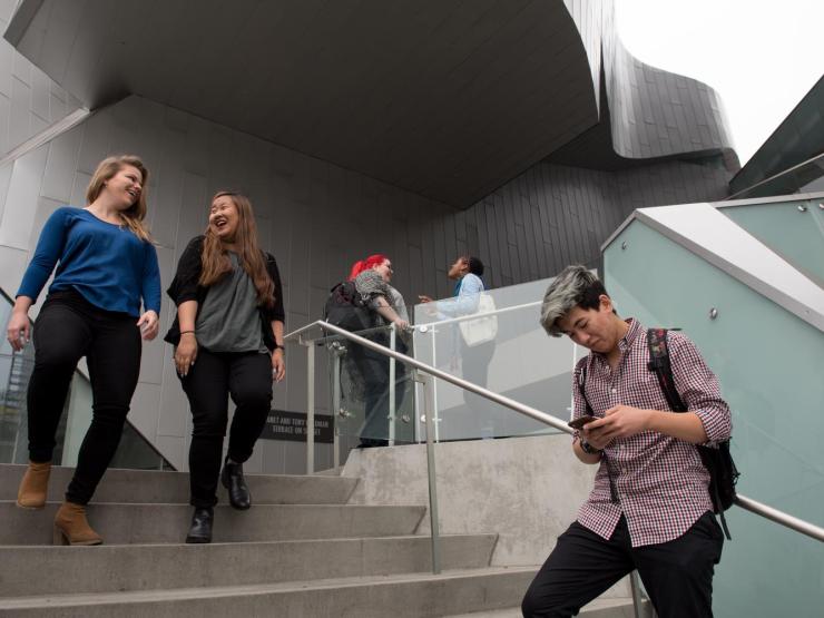 Students descending a staircase outdoors at the Los Angeles campus