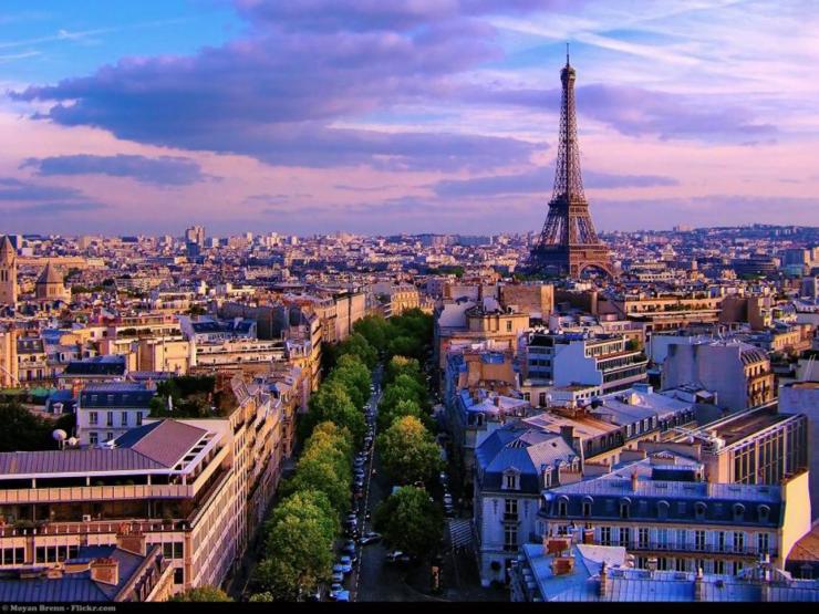 View of Paris skyline, including the Eiffel Tower in the evening