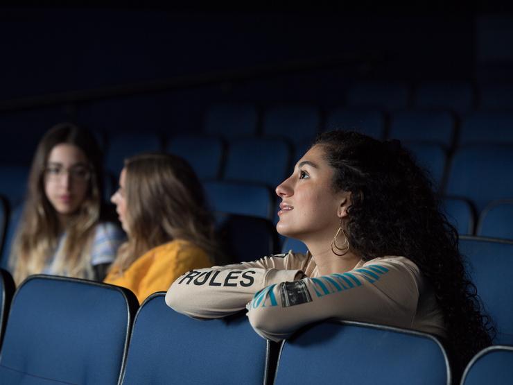 students screen movie inside the Bright Family Screening Room