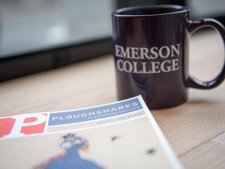 Emerson coffee mug sitting on a table with Ploughshares