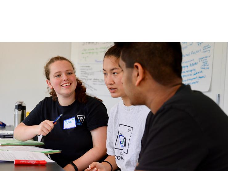 Three people talking with each other