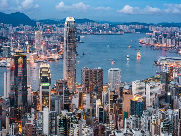 Hong Kong skyline at dusk. Photo credit: iStock.com/CHUNYIP WONG.jpg