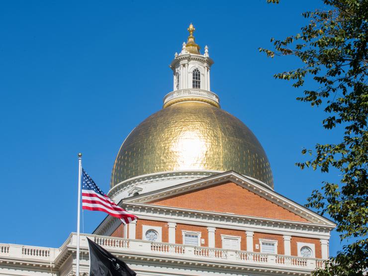 Boston state house with American flag