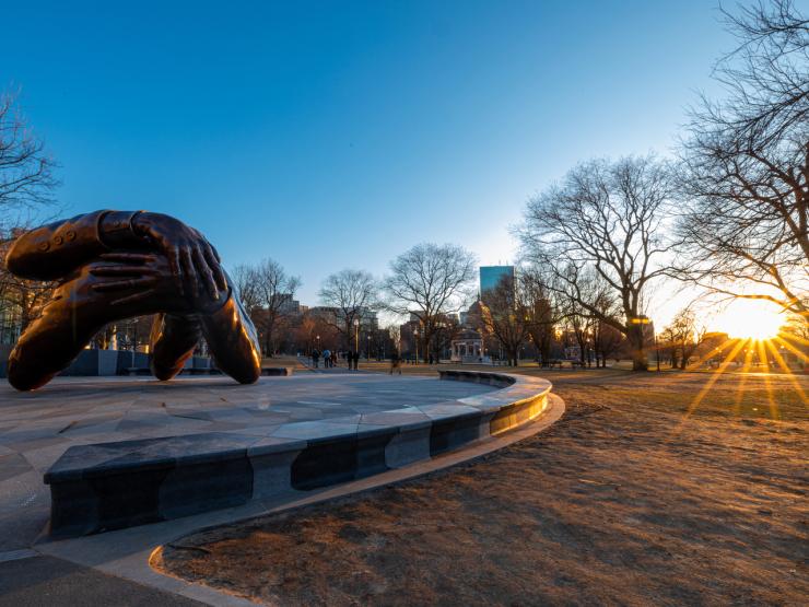 A view of the Martin Luther King, Jr. memorial sculpture at Boston Common, which features the arms of Dr. King and Coretta Scott King in an embrace