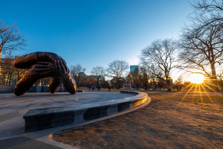 A view of the Martin Luther King, Jr. memorial sculpture at Boston Common, which features the arms of Dr. King and Coretta Scott King in an embrace