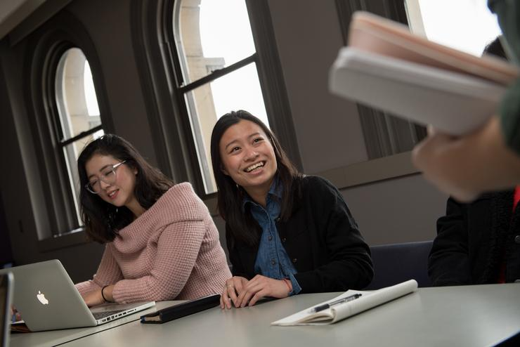 student smiling in a class