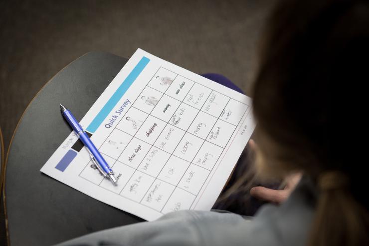 Image of paper and pen on table