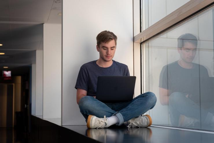 student using a laptop