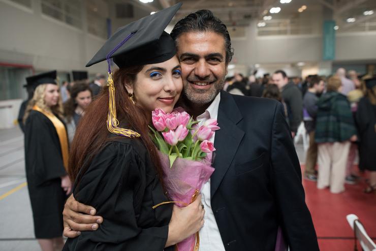 Daughter and father at Commencement