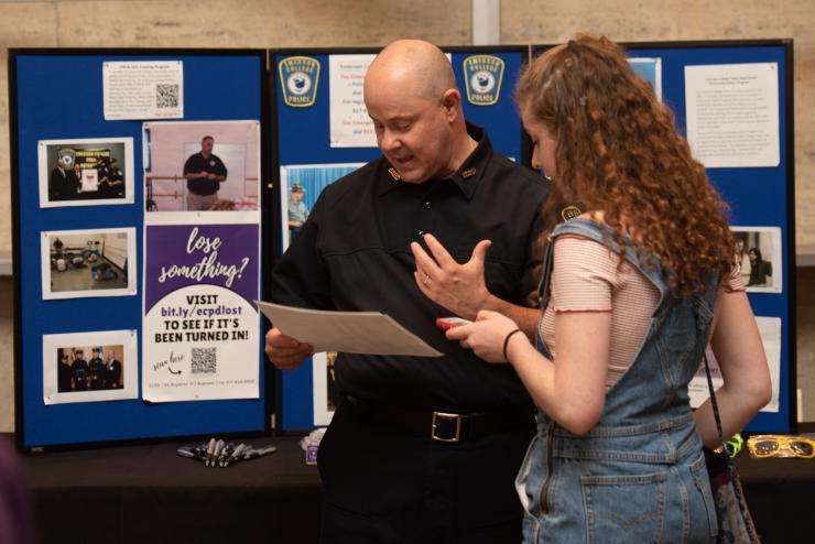 police officer talking to a student